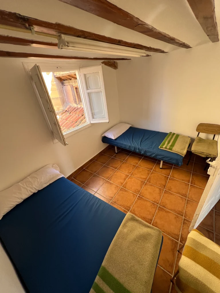 Cama individual habitacion doble